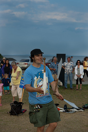 photos of a juggler at krishna festival of India, thunder bay ontario